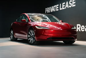 Red Tesla Model 3 Highland Front Side